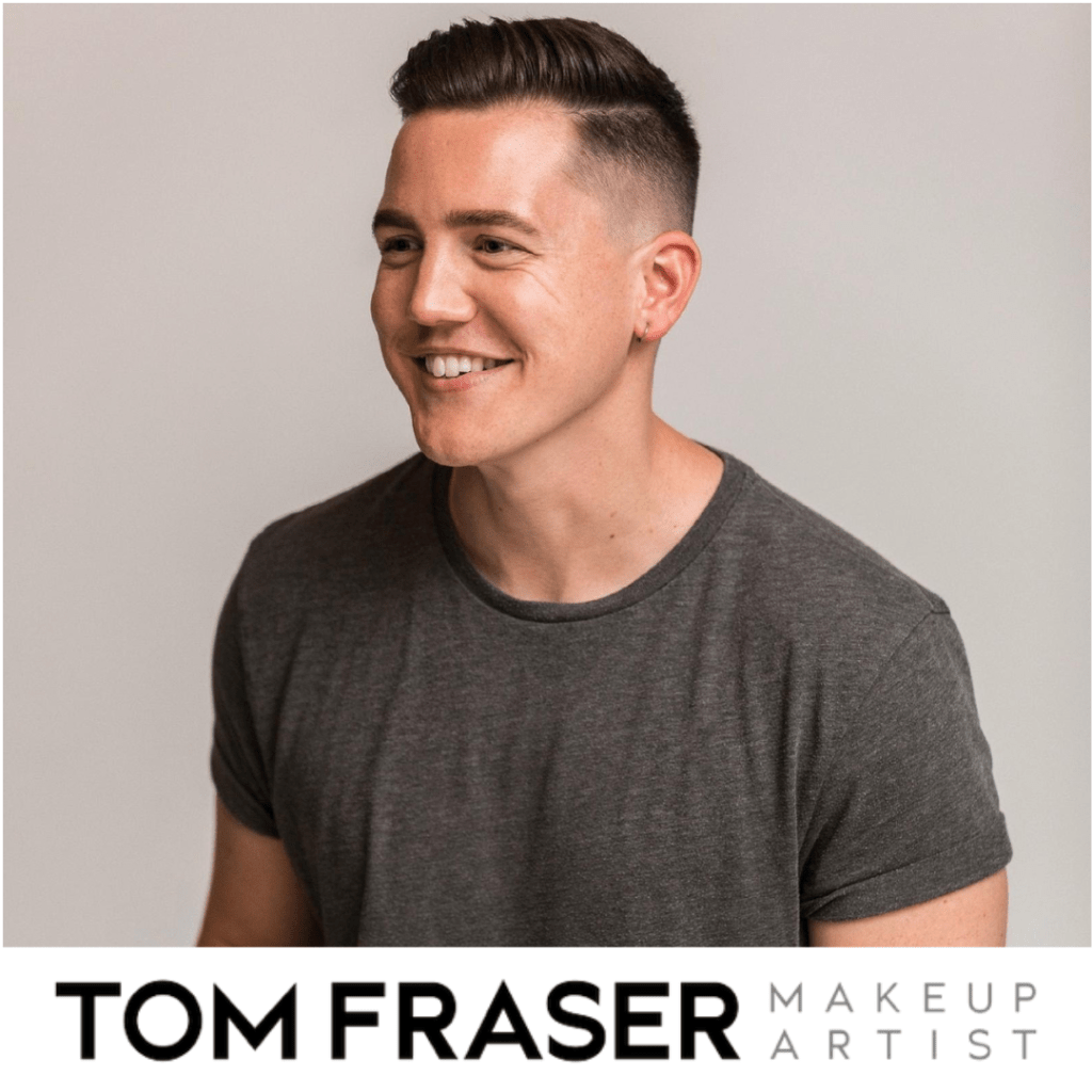 Side profile photo of a man in a grey t-shirt with plain grey backgroud